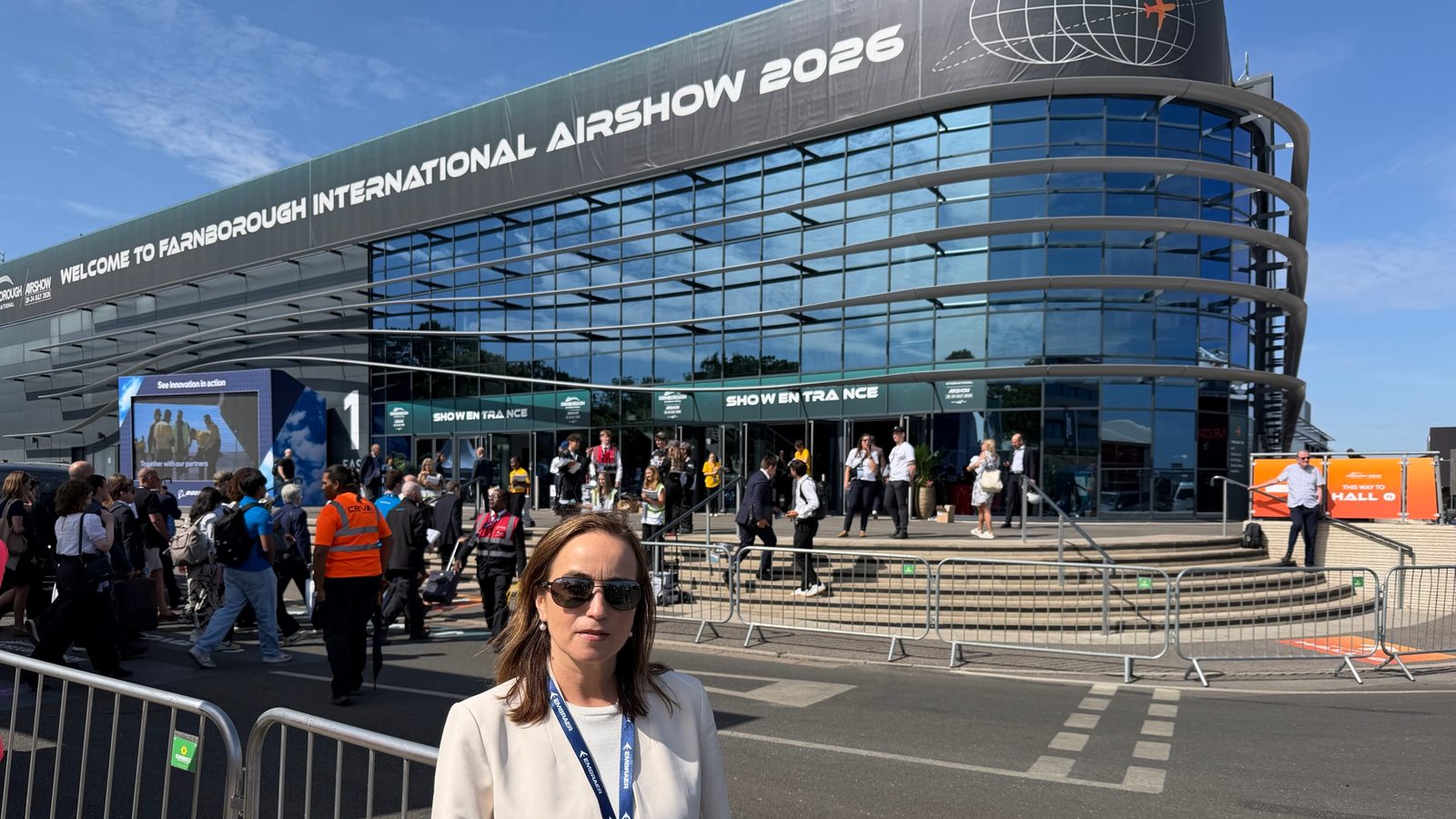 Silvia Flores outside the show entrance at Farnborough International Airshow 2026 on opening day.